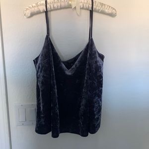 Flowy, purple, velvet material top. Cute for night out with a jacket!